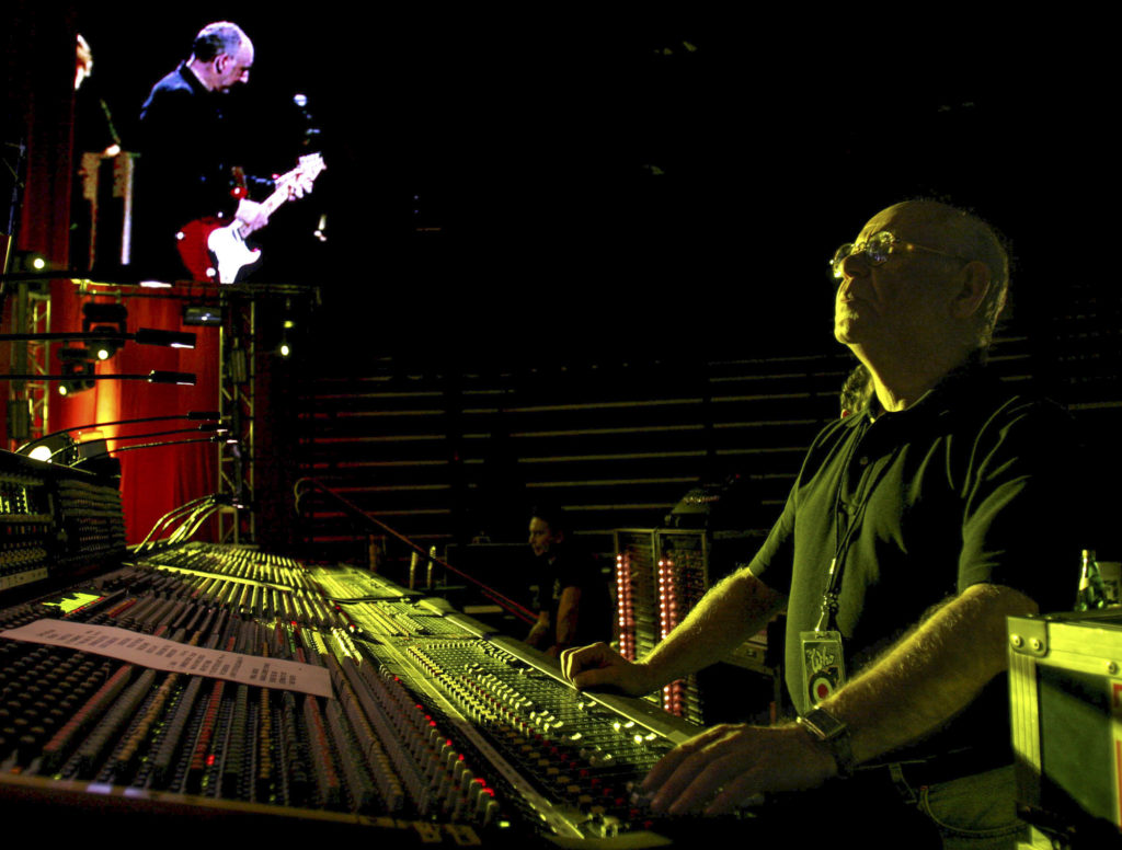 Onstage Sound Engineer Bob Pridden adjusts the sound during The Who's performance at the Toyota Center, Houston, TX, US