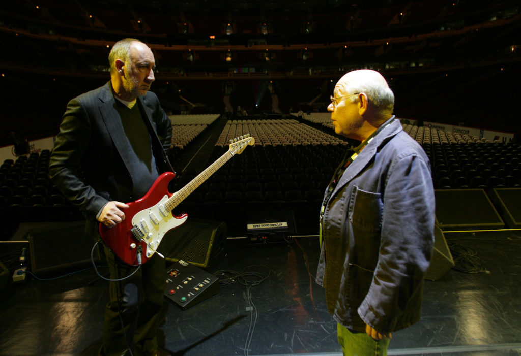 Onstage Sound Engineer Bob Pridden chats with The Who's Pete Townshend during a sound check at Wells Fargo Center, Des Moines, IA.