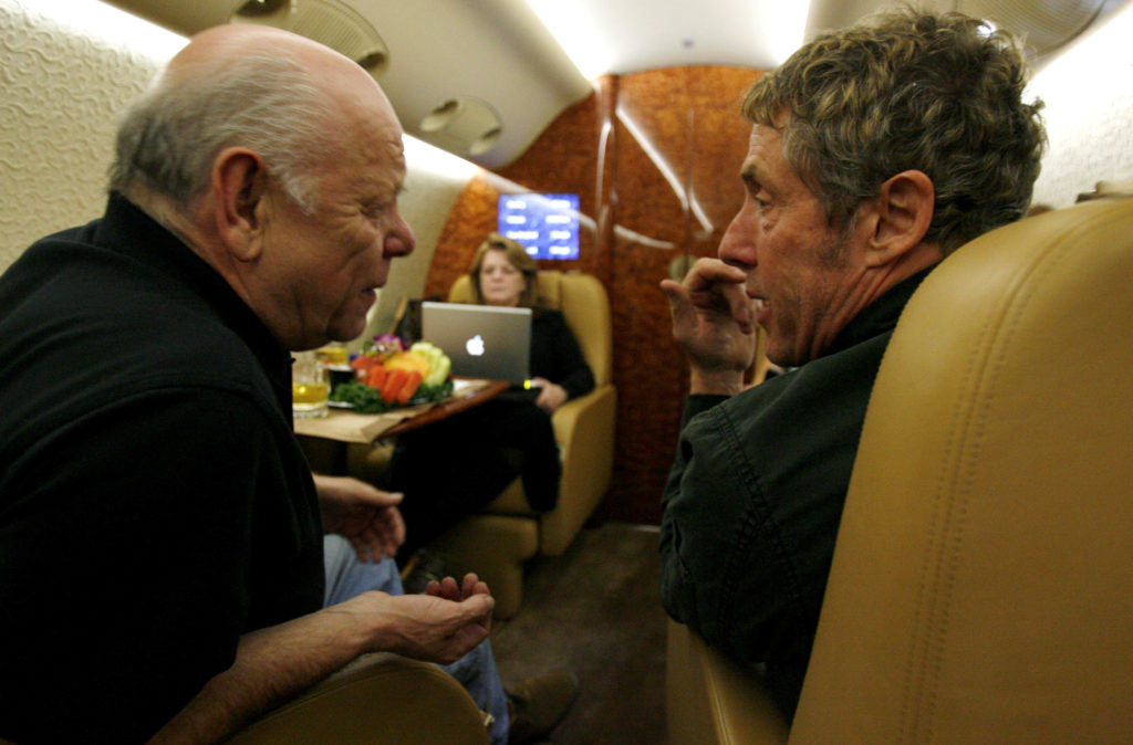 The Who's onstage sound engineer Bob Pridden and singer Roger Daltrey chat on their private jet on the way to Florida during the 2006 tour.