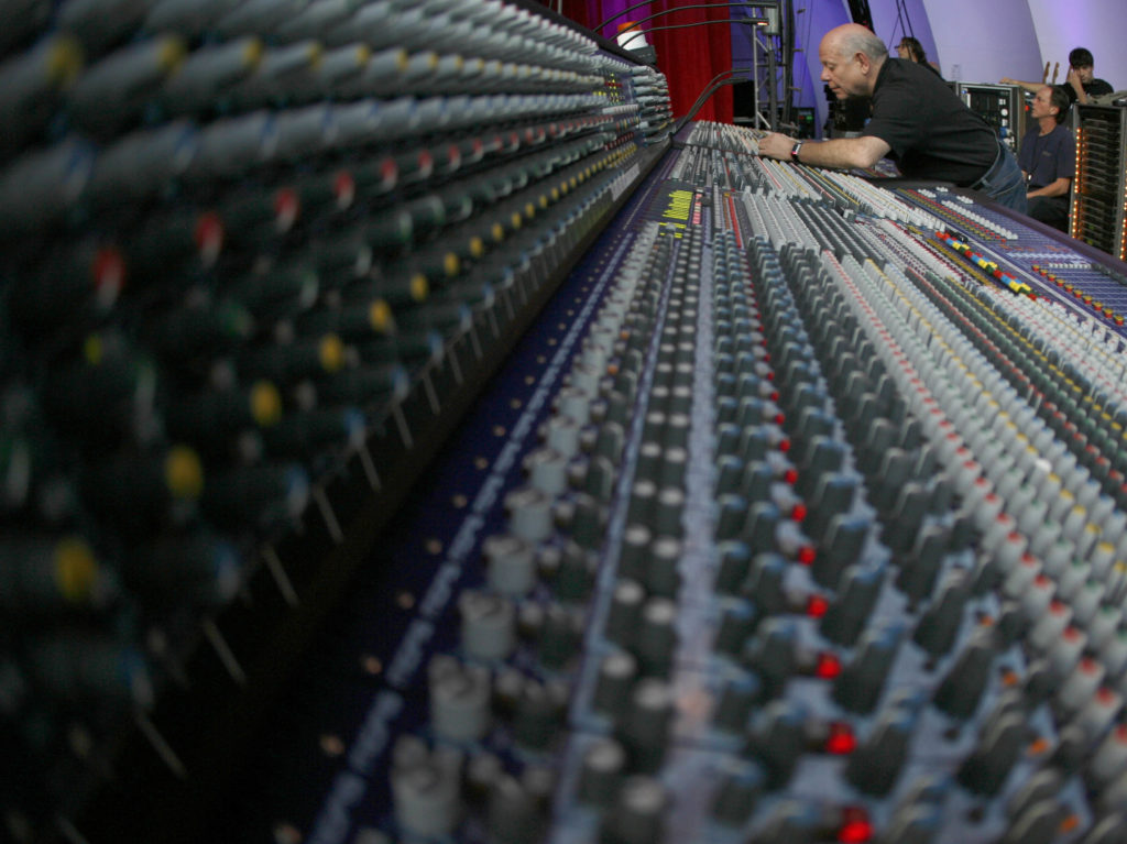 The Who's onstage sound engineer Bob Pridden works his magic at the mixing board during a sound check at the Hollywood Bowl on November 5, 2006.